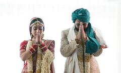 Indian couple making their prayers at the wedding ceremony. Indian couple making their prayers at the wedding ceremony.