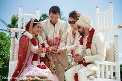 Indian bride's emotional moment looking at groom Indian bride's emotional moment looking at groom