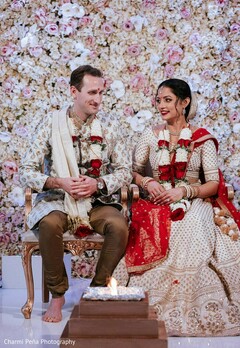 Indian bride and groom with garlands Indian bride and groom with garlands