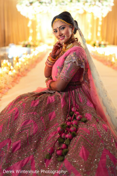 Amazing bride details and embroidery decoration on wedding lehnga Amazing bride details and embroidery decoration on wedding lehnga