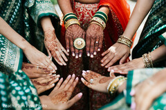 Lovely bride and bridesmaids showing off the incredible Mehndi art Lovely bride and bridesmaids showing off the incredible Mehndi art