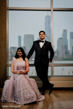 Lovely Indian couple in their wedding reception outfits Lovely Indian couple in their wedding reception outfits