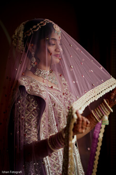 Indian bride glowing in her wedding attire. Indian bride glowing in her wedding attire.