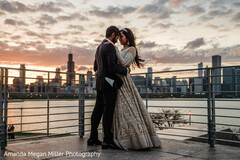 Romantic Indian bride and groom looking at each other Romantic Indian bride and groom looking at each other