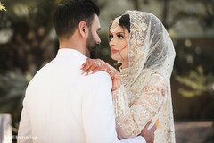 Adorable Indian bride looking at groom Adorable Indian bride looking at groom
