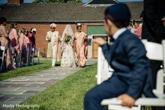 Lovely bride making her entrance to the wedding ceremony Lovely bride making her entrance to the wedding ceremony