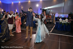 Adorable indian couple showing some dance moves Adorable indian couple showing some dance moves