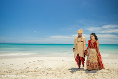 Lovely indian bride and groom by the beach photo shoot Lovely indian bride and groom by the beach photo shoot
