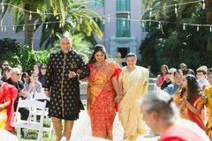 Happy indian bride walking down the aisle Happy indian bride walking down the aisle