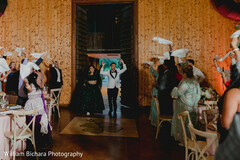 Indian newlyweds making their entrance to wedding reception Indian newlyweds making their entrance to wedding reception