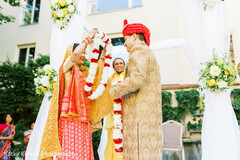 Traditional Indian bride and groom's jaimala ceremony. Traditional Indian bride and groom's jaimala ceremony.