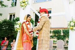 Indian bride and groom at their Jai Mala Ceremony Indian bride and groom at their Jai Mala Ceremony