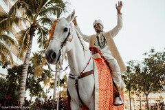 Elegant Indian groom riding baraat white horse. Elegant Indian groom riding baraat white horse.