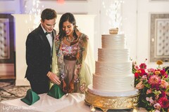 Elegant Cake Cutting: A Vibrant Wedding Celebration