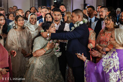 A Sweet Embrace Amidst Celebration