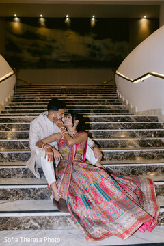 A Couple's Staircase Embrace A Couple's Staircase Embrace