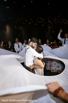 A Tender Embrace Amid Celebration