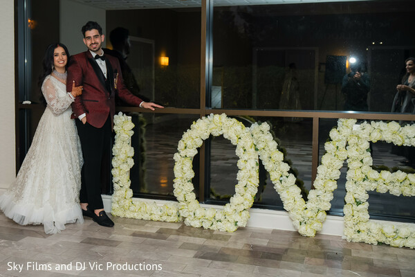wedding couple,love sign,newlyweds,wedding photoshoot,bride and groom,elegant wedding