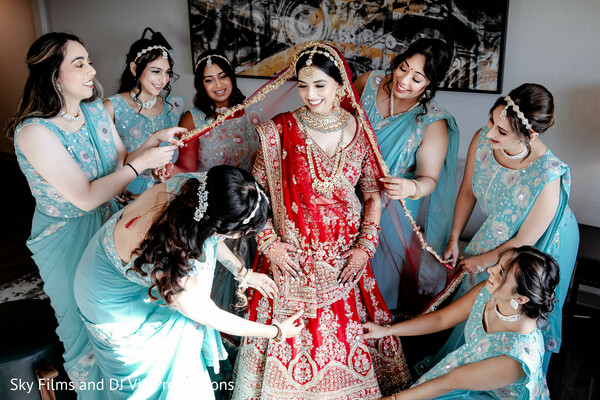 bridal squad,bridesmaids love,indian wedding,red bridal lehenga,sisterhood,wedding traditions