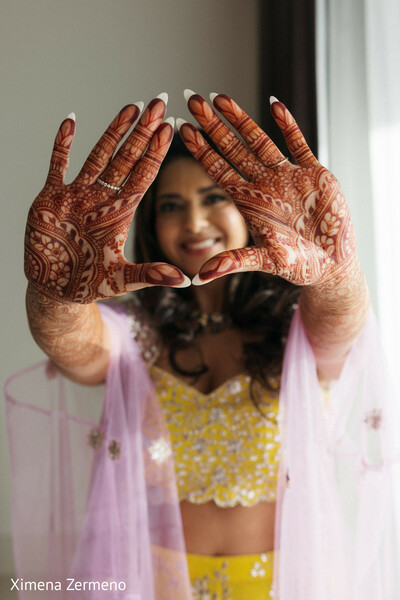 bridal mehndi,henna artistry,joyful bride,pre-wedding rituals,south asian bride,cultural beauty