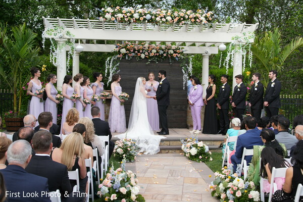 first kiss,wedding romance,bride and groom,romantic moment,south asian groom,western bride