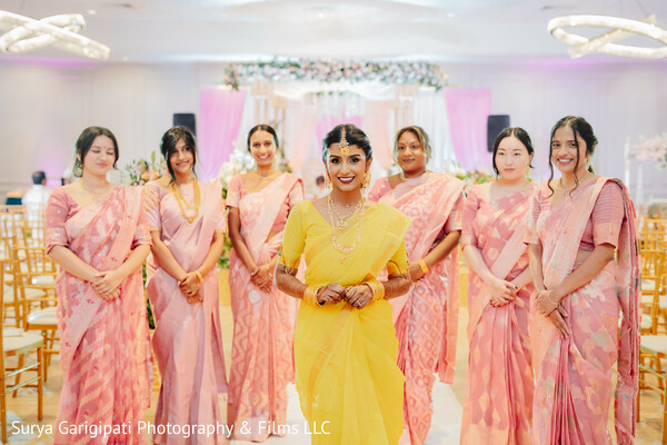 bride with bridesmaids,pastel wedding palette,south indian bridal party,tamil bride,pink sarees