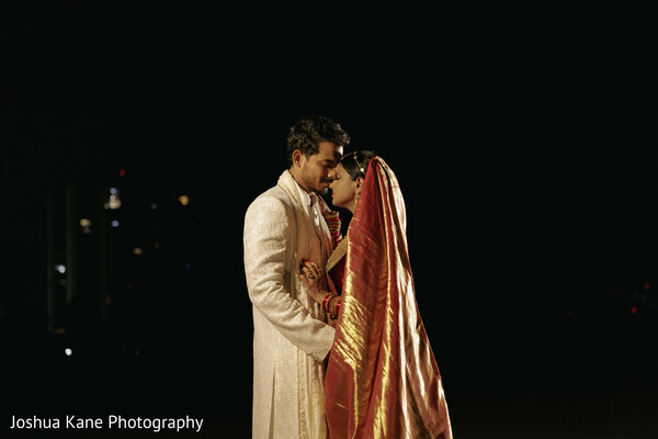bride and groom candid,indian wedding museum shoot,red saree bride,white sherwani groom