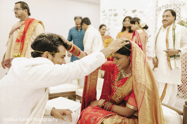 sindoor ritual,hindu wedding,bride and groom,red saree bride,emotional wedding moment,traditional ceremony