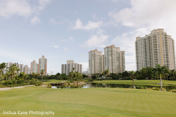 golf course wedding,scenic venue,outdoor ceremony view,skyline background,nature and city