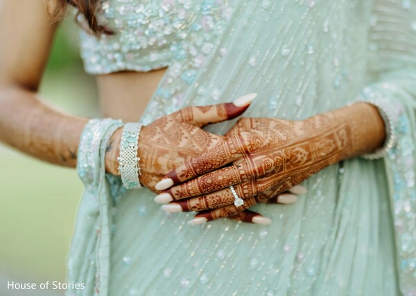 mehndi hand close-up,bridal jewelry details,soft mint saree,indian bride hands,engagement ring focus