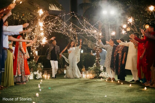 sparkler wedding entrance,nighttime wedding magic,bride and groom walk-in,romantic sparkler tunnel,fairy light decor