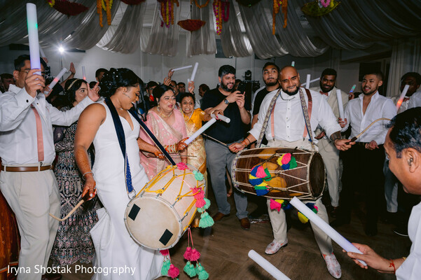 wedding party dance,dhol drumming,glow sticks party,high-energy reception