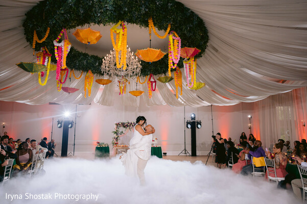 wedding dip pose,first dance kiss,romantic reception moment,fog machine photo