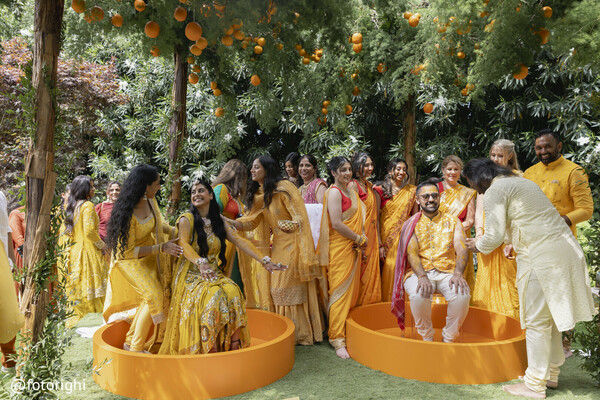 haldi celebration,citrus-themed pre-wedding,indian wedding traditions,bride groom haldi,fun wedding moment
