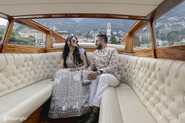 lake como wedding,boat ride newlyweds,luxury wedding transportation,indian couple in boat