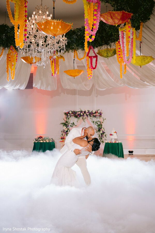 wedding dip moment,fog-filled dance floor,first dance magic,bride and groom dance