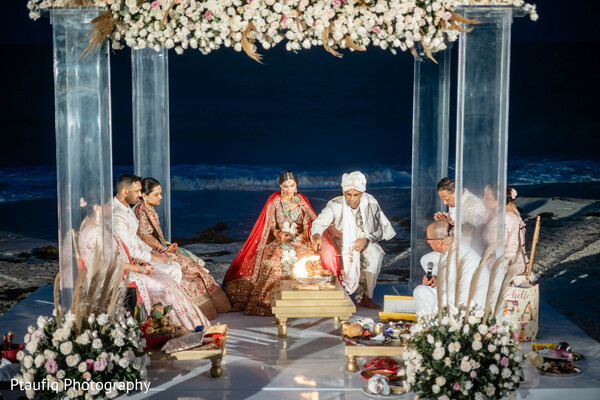 hindu wedding,beach mandap,nighttime ceremony,indian rituals,wedding fire ritual,destination wedding,romantic ocean view