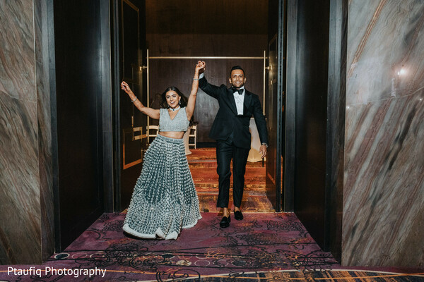 reception entrance,couple celebration,happy bride and groom,south asian reception