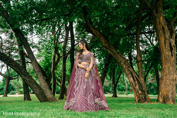 bridal portrait outdoors,mauve lehenga,forest wedding shoot,south asian bridal fashion,dreamy wedding moment