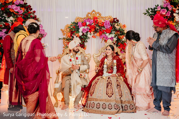 wedding ceremony,family blessing,floral mandap,south asian wedding,vibrant decor