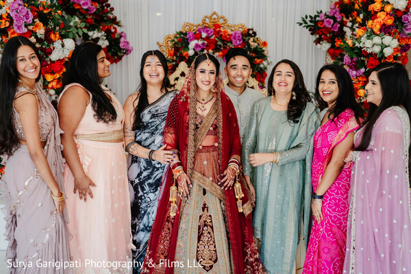 bride and bridesmaids,wedding florals,sari styling,indian wedding group photo,joyful women