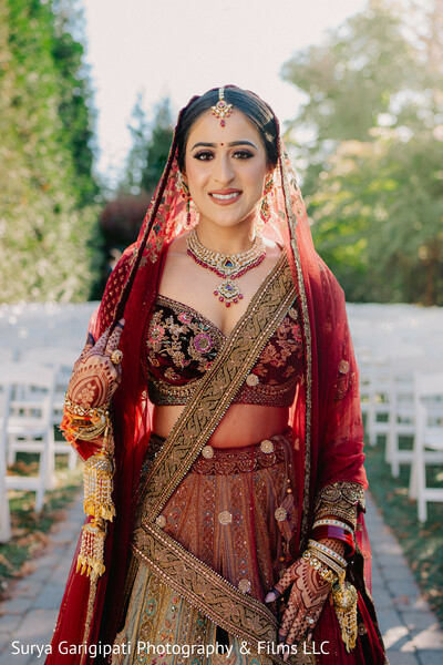 bridal solo shot,red bridal lehenga,indian wedding fashion,south asian bride,bridal makeup