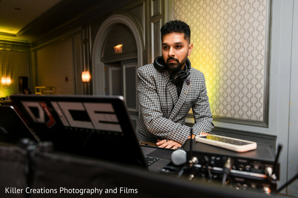 wedding dj,modern reception,music entertainment,party night,dj performance,wedding beats,celebration soundtrack,dance floor setup,nightlife wedding,event lighting