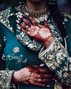 The Meaning Behind Mehndi & Modern Designs for 2025 Brides