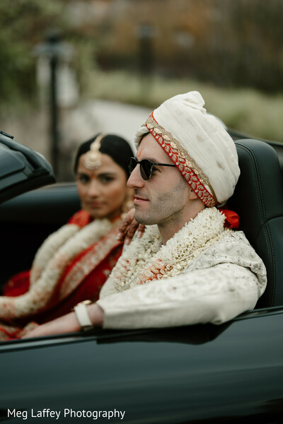 wedding car exit,stylish couple,convertible wedding exit,bride and groom car photo,cool wedding moment.