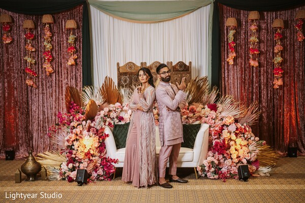 bride and bridesmaids,floral wedding decor,bridal portrait,family wedding photo,colorful flowers.