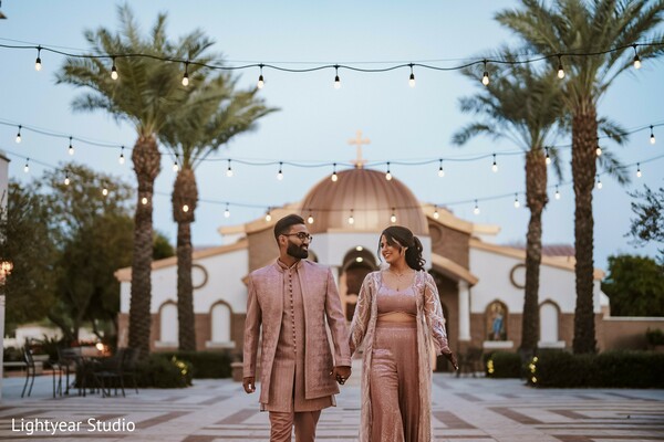 groomsmen,palm trees,wedding entrance,string lights,modern wedding photography.