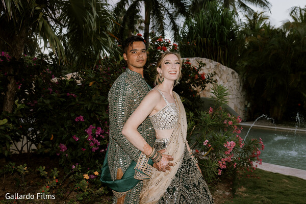 romantic moment,nature backdrop,tropical garden,candid couple shot,resort setting