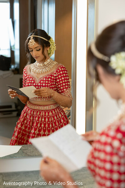 bride alone,candid moment,vow reading,pre-wedding,emotional prep,indian bride