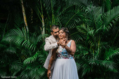 Couple Embrace in Lush Greenery Couple Embrace in Lush Greenery